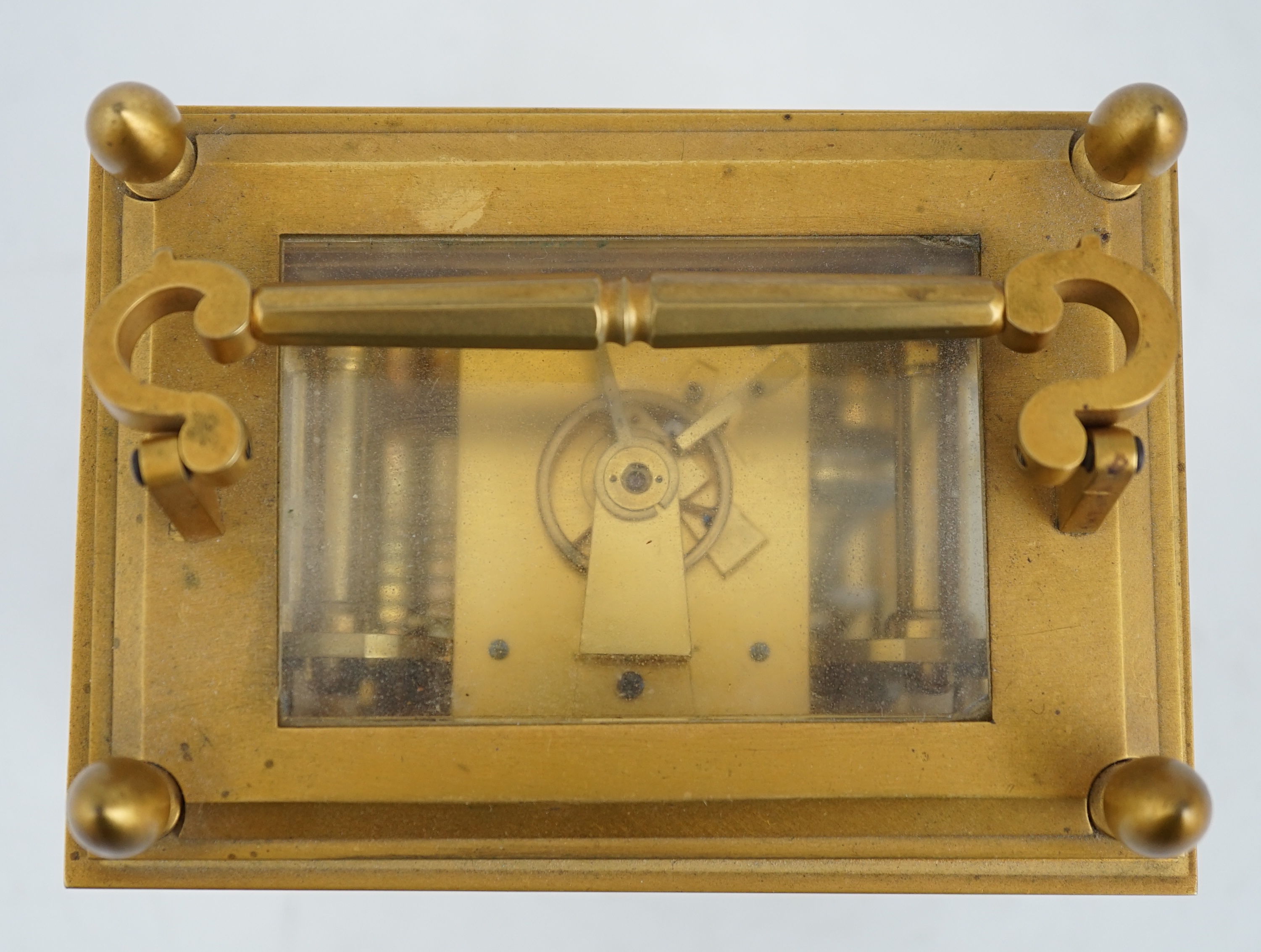 James Gowland of London, a rare mid 19th century giant gilt bronze single fuseé carriage timepiece, 22cm high to handle